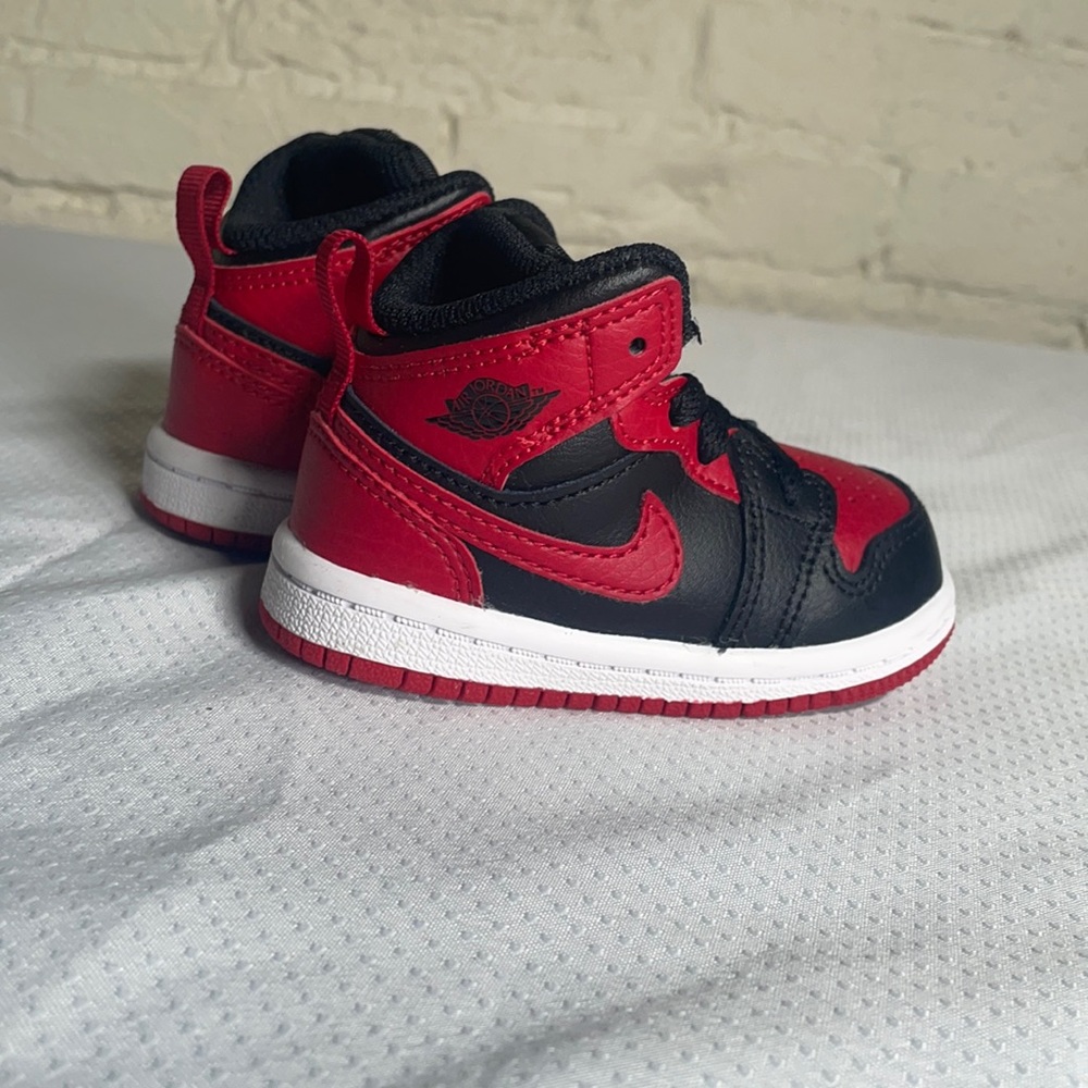 Brand new Red / black Jordan 1 mids